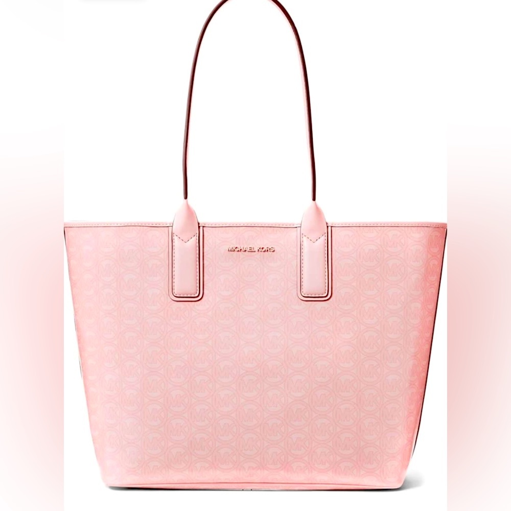 SOLD!Michael Kors Large Jodie Tote
Handle Drop 8.5”
17.75”W X 12”H X 6.75”D